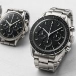 Omega Speedmaster Moonwatch-inspired steel chronograph with a black tachymeter bezel and three subdials